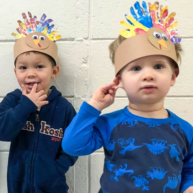Earlychild Services - Two toddlers from childcare classroom dressed up for holiday Thanksgiving parade